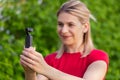 Woman holding DJI Osmo Camera