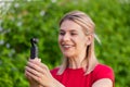 Woman holding DJI Osmo Camera