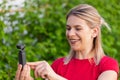 Woman holding DJI Osmo Camera