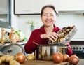 Woman holding dried mushrooms Royalty Free Stock Photo