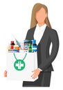 Woman holding drugstore bag