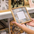 Woman holding empty photo frame Royalty Free Stock Photo