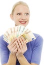 Woman holding euro money Royalty Free Stock Photo