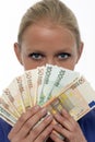 Woman holding euro money Royalty Free Stock Photo