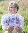 Woman holding 2500 euro Royalty Free Stock Photo