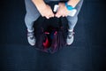 Woman holding fitness bag and smartphone Royalty Free Stock Photo