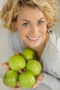 woman holding five apples Royalty Free Stock Photo