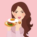 Woman holding fresh sandwich in her hand with egg