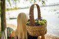 Woman holding a freshly harvested grapes basket Royalty Free Stock Photo