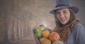 WOman holding fruit basket in Autumn in forest Royalty Free Stock Photo