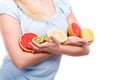 Woman holding fruits kiwi. orange, lemon and grapefruit Royalty Free Stock Photo