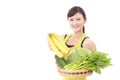 Woman holding fruits and vegetables Royalty Free Stock Photo