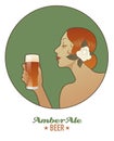 Woman holding a glass of beer. Amber Ale.