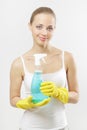 Woman holding glass cleaner Royalty Free Stock Photo