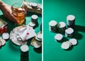 Woman holding glass of cognac near money, playing cards, dice and casino tokens on green Royalty Free Stock Photo