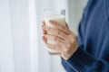 Woman holding a glass of milk Royalty Free Stock Photo