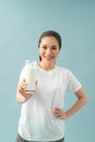 Woman holding a glass of milk