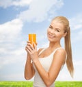 Woman holding glass of orange juice Royalty Free Stock Photo