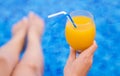 Woman holding glass with orange juice Royalty Free Stock Photo