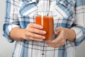 Woman holding glass of tasty carrot juice Royalty Free Stock Photo