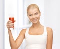 Woman holding glass of tomato juice Royalty Free Stock Photo