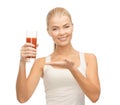 Woman holding glass of tomato juice Royalty Free Stock Photo