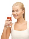 Woman holding glass of tomato juice Royalty Free Stock Photo