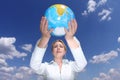 Woman holding globe Royalty Free Stock Photo