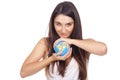 Woman holding a globe in hands