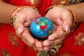 Woman holding globe on her hands Royalty Free Stock Photo