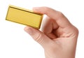 Woman holding gold bar on white background, closeup Royalty Free Stock Photo