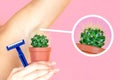 A woman holding a green cactus in a brown pot and a razor near the armpits. the concept of depilation, hair removal and