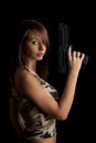 Woman holding gun