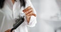 Woman losing hair on hairbrush in hand, soft focus Royalty Free Stock Photo