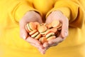 Woman holding handful of delicious gummy burger shaped candies, closeup Royalty Free Stock Photo