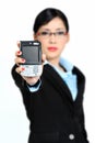 Woman holding Handphone (Focus on Screen) Royalty Free Stock Photo