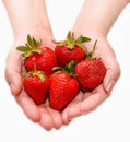 Woman holding in hands ripe fresh strawberries isolated on white. Royalty Free Stock Photo