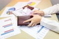 Woman holding in hands wallet with euro money in the house Royalty Free Stock Photo