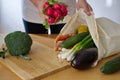 Woman holding healthy vegetables in sustainable bag Royalty Free Stock Photo