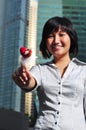 Woman Holding A Heart Shape Stick