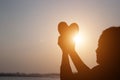 A woman holding a heart shape Royalty Free Stock Photo