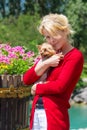 Woman holding her dog Royalty Free Stock Photo