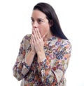 Woman holding her face in astonishment. Royalty Free Stock Photo