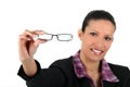 Woman holding her glasses far Royalty Free Stock Photo