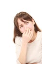 Woman holding her nose because of a bad smell Royalty Free Stock Photo