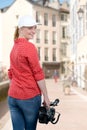 Woman holding his professional camcorder in the street Royalty Free Stock Photo