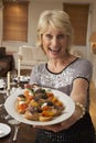 Woman Holding Hors D'oeuvres On Plate Royalty Free Stock Photo