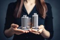 A woman holding house building model in her hands, image for real estate investment business and residential mortgage loan concept Royalty Free Stock Photo