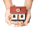 Woman holding house model in hands Royalty Free Stock Photo