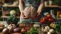 Woman Holding Human Brain Model Among Fresh Vegetables Royalty Free Stock Photo